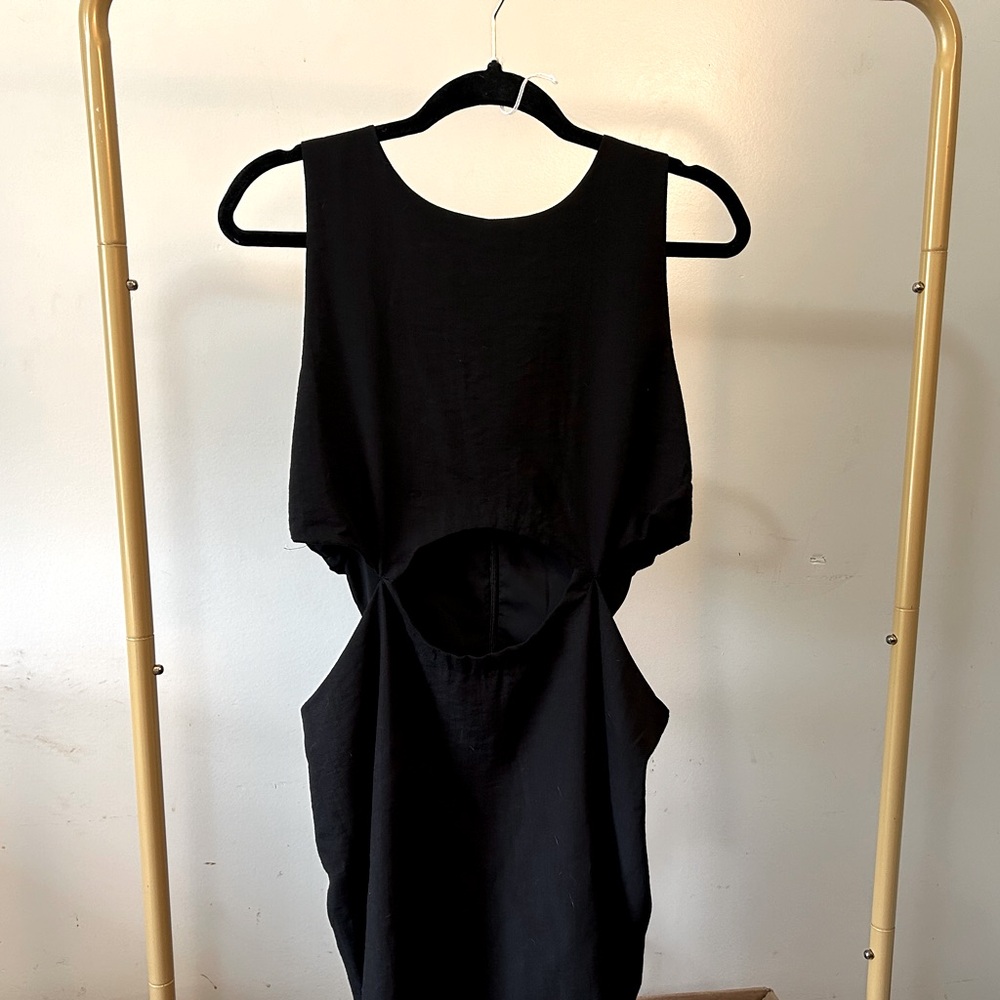 Black cutout dress by Kourt